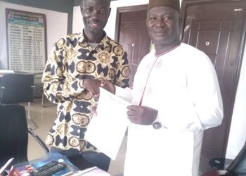IBADAN NORTHWEST COUNCIL BOSS  PRESENTS LETTER  OF APPOINTMENT  TO POLITICAL  HEAD, SWEARS- IN CHIEF OF STAFF.
