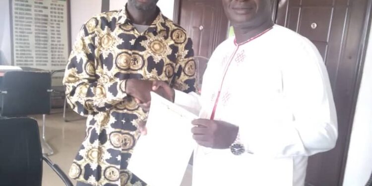 IBADAN NORTHWEST COUNCIL BOSS  PRESENTS LETTER  OF APPOINTMENT  TO POLITICAL  HEAD, SWEARS- IN CHIEF OF STAFF.