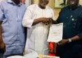 Lagelu Chairman, Hon. Mudashiru Kamorudeen Swears in Alade Gbenga as New LG Secretary