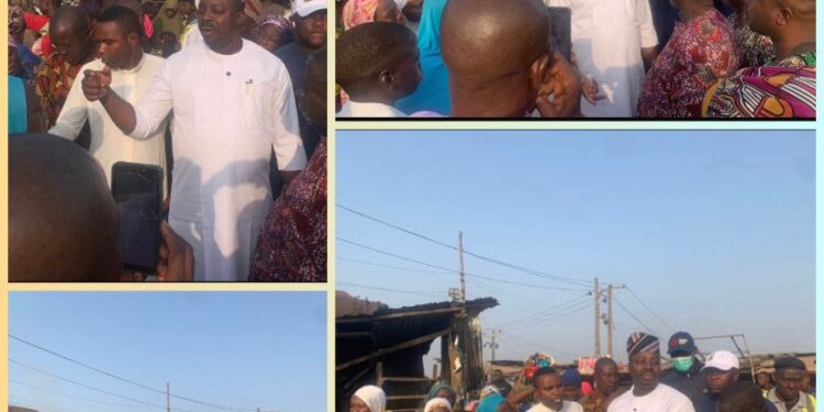 Akinyele Council Boss, Hon Akinwole Akinleye visits Oja Agbe market inferno scene, sympathizes with victims.