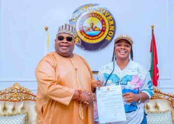 Governor Adeleke presents appointment letter to Oluwatosin Adejumo, the puff-puff seller who went viral.
