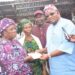 Oloye Sina Alabi, Chief ‘Gbenga Olayemi Present “Senator Alli’s N25m Pledge” to Bode Market Traders